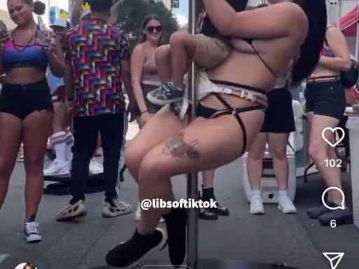 Video posted online showed a young boy in a baseball hat twirling around a pole straddling a woman wearing a strappy thong and a bikini top while grown woman looked on at this year's Charlotte Pride festival in North Carolina