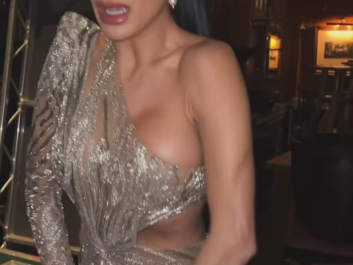 Nicole Scherzinger poked fun at her wardrobe malfunction as she shared a video of herself struggling with her outfit on New Year's Eve